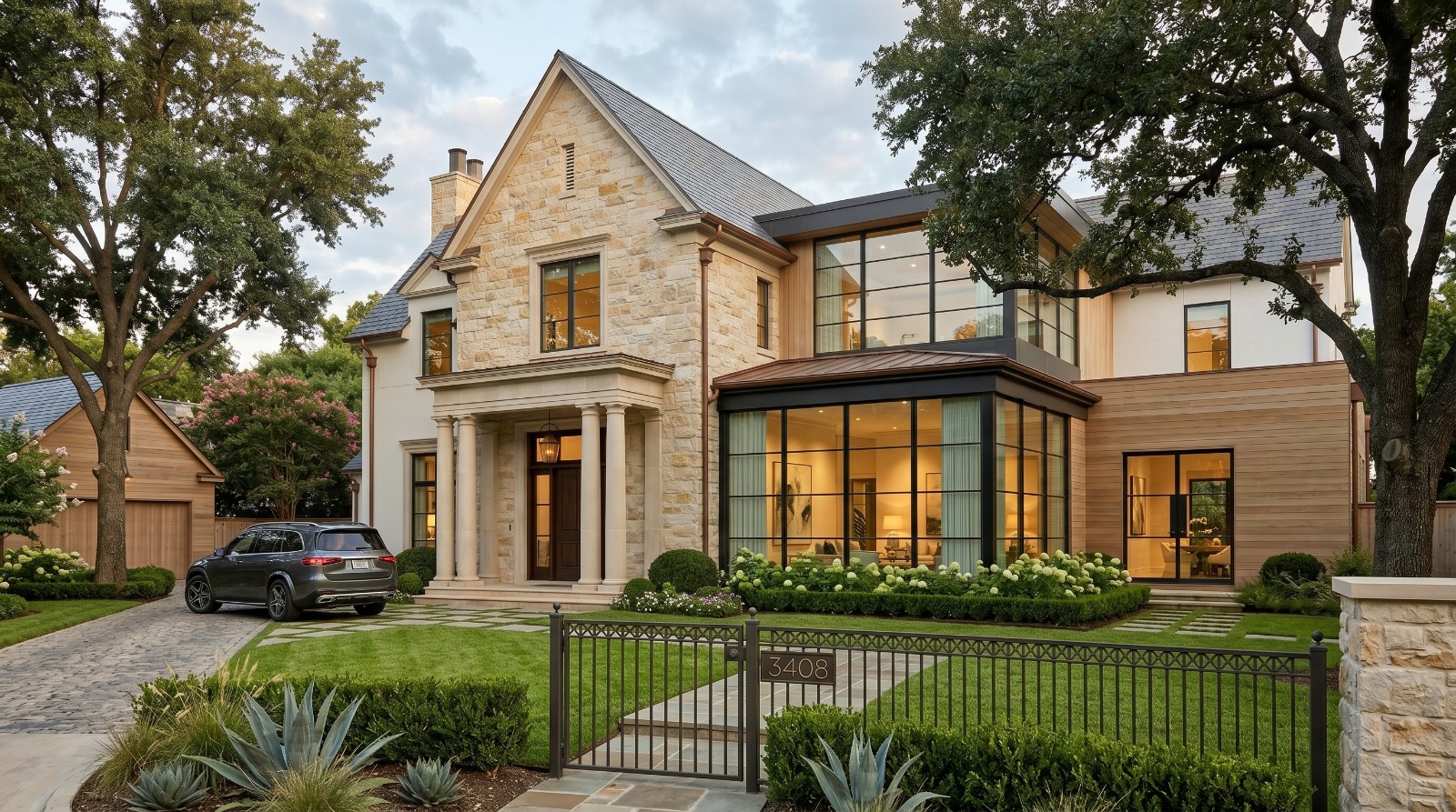 Luxury two-story modern home with elegant entrance, driveway, and landscaped front yard.