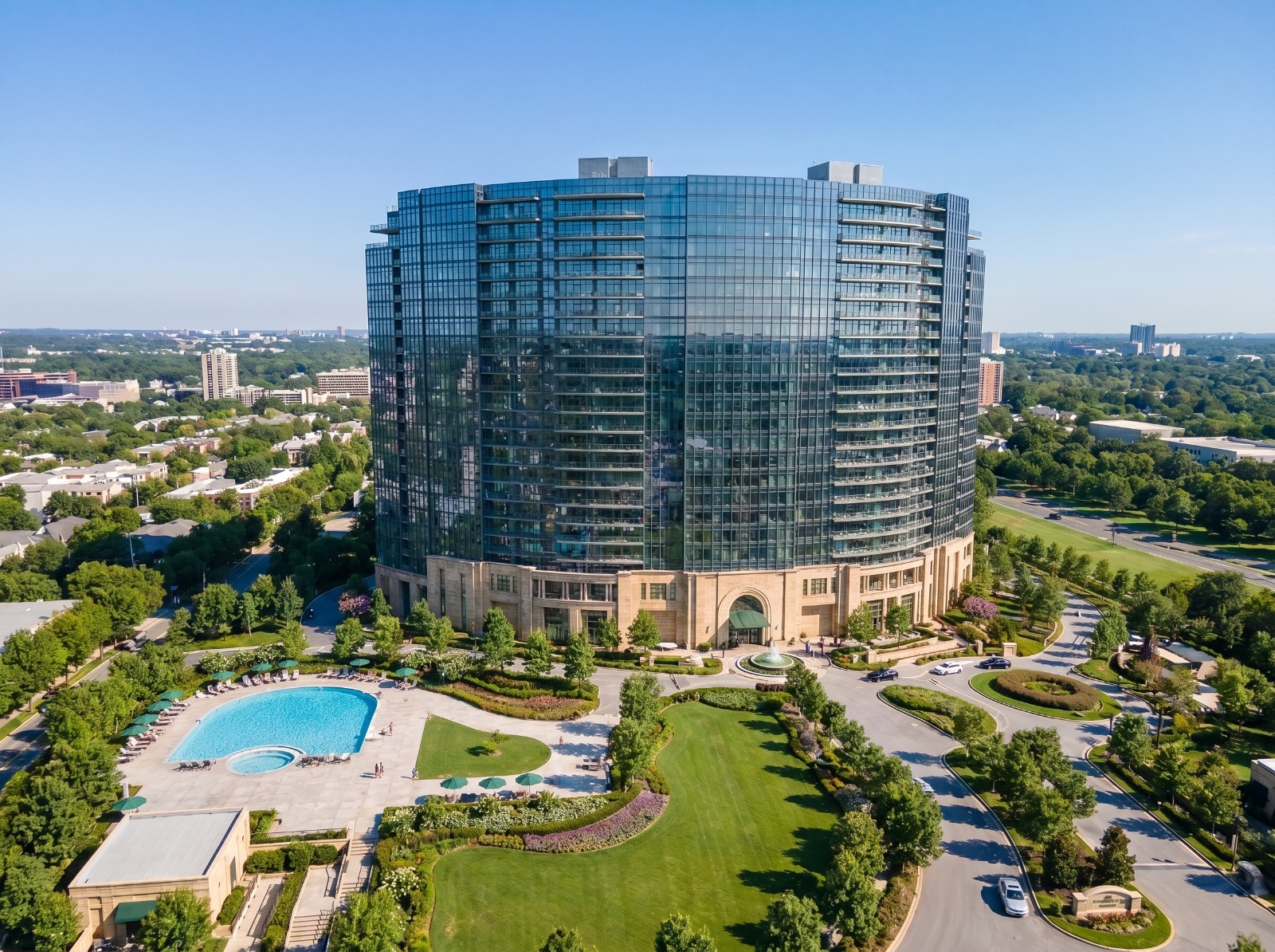 Modern luxury high-rise tower with pool and landscape exterior rendering
